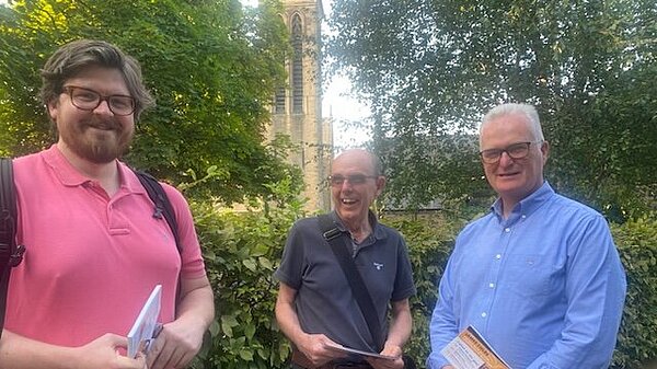 James, Peter and Philip in front of St George's Church