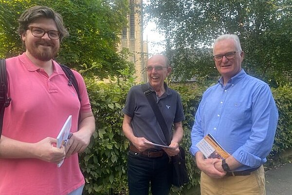 James, Peter and Philip in front of St George's Church