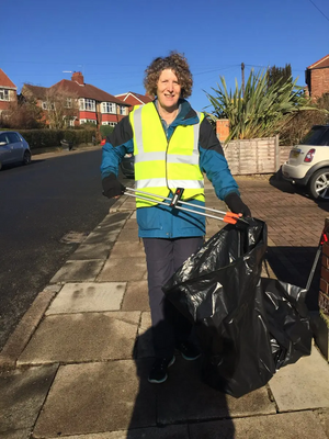 Cllr Wendy Taylor cleans up