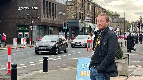 Cllr Colin Ferguson looking out over Gosforth High Street