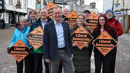 Tim Farron with volunteers